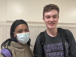 Saniyah page choosing to wear a mask while Patrick Barry is not. 