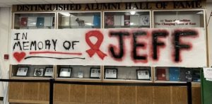 Banner made by students of East hangs at door 1 the week after Jeff Eatons passing. 