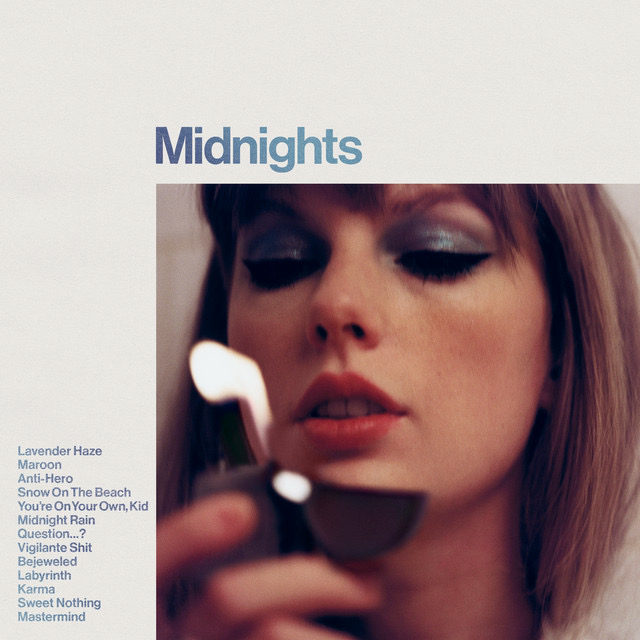 Pictured is Taylor Swifts album cover for “Midnights” with the original 13 tracks listed to the left. Courtesy of Spotify.