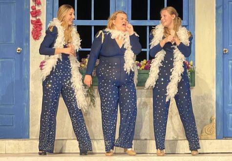Peyton Zondor as Tanya (left), Fiona Bilkey as Donna (center) and Linaea Walsh as Rosie (right) sing to Dancing Queen in the musical Mamma Mia which begins November 15. Photos courtesy of Micki Marin Bunting. 